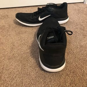 Black Nike running shoes